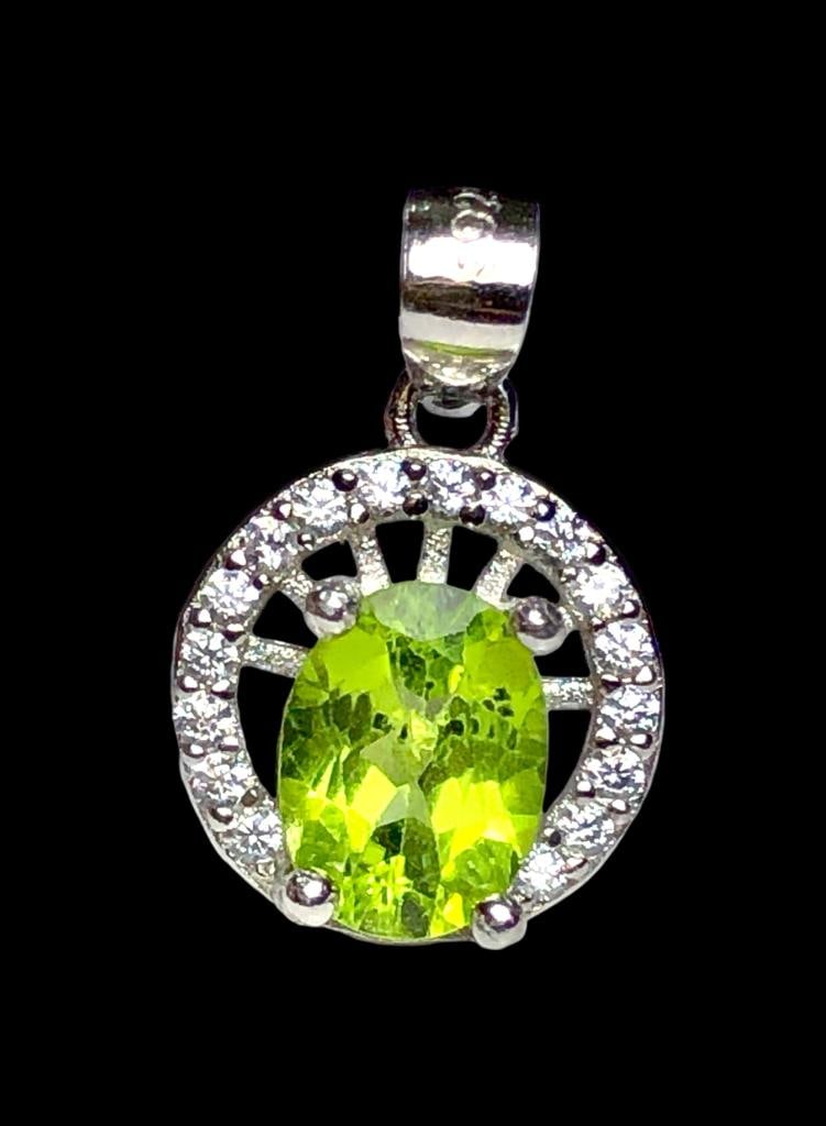 peridot necklace, statement necklace, August birthstone, silver pendant: peridot necklace, statement necklace, August birthstone, silver pendantFREE SHIPPING Shipping rates are determined by Parcel weight and destination.