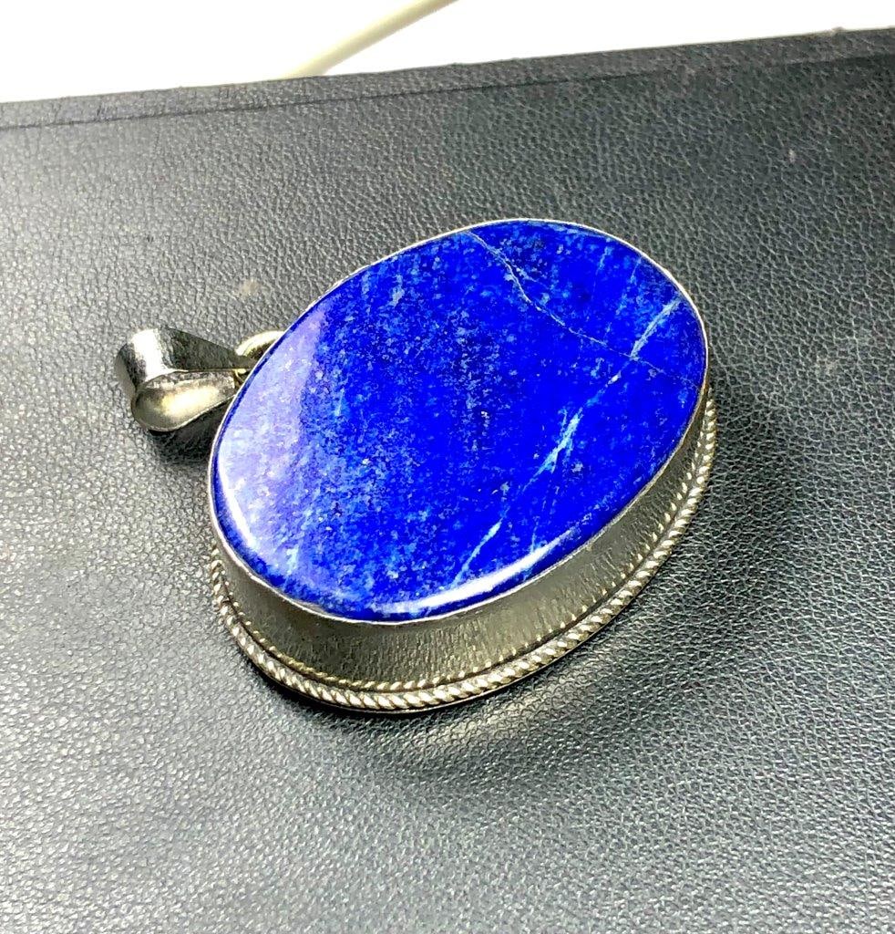 Beautiful and Shiney Lapis Lazuli Gale Pendant: Beautiful and Shiney Lapis Lazuli Gale Pendant Shipping: $23.00. Shipping rates are determined by Parcel weight and destination.