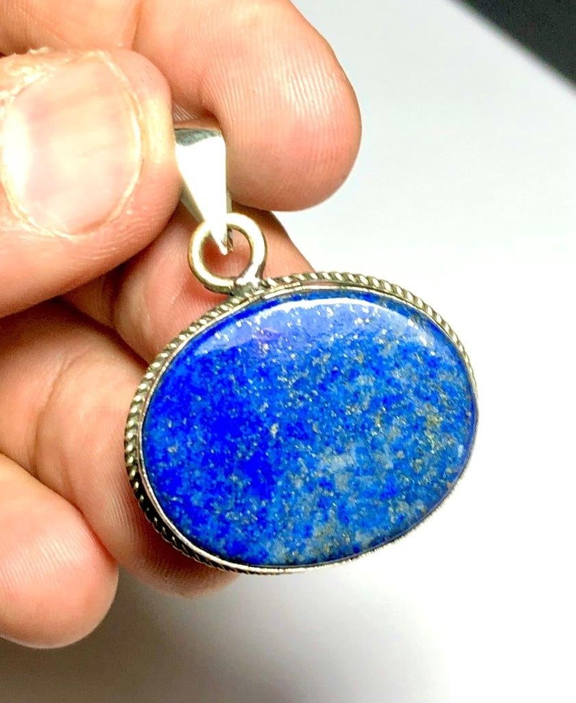 Beautiful Gale Pendant With Natural Lapis Lazuli: Beautiful Gale Pendant With Natural Lapis Lazuli Shipping: $23.00. Shipping rates are determined by Parcel weight and destination.