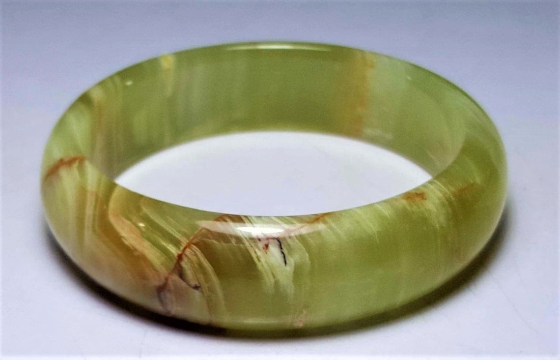 Greenish Onyx Healing Bangle: Greenish Onyx Healing Bangle Shipping: $23.00. Shipping rates are determined by Parcel weight and destination.