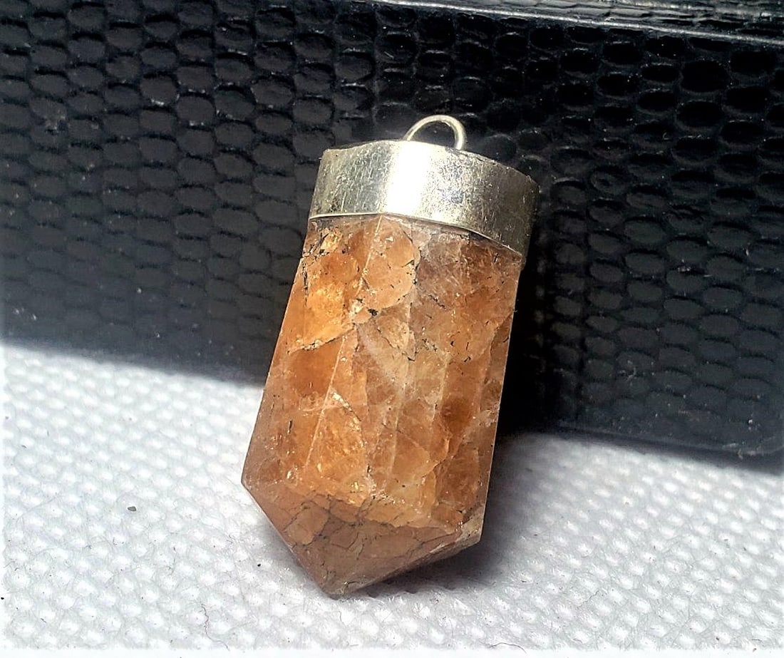 Hessonite Garnet Pendant: Hessonite Garnet Pendant 24X13X10 mm Shipping: $23.00. Shipping rates are determined by Parcel weight and destination.