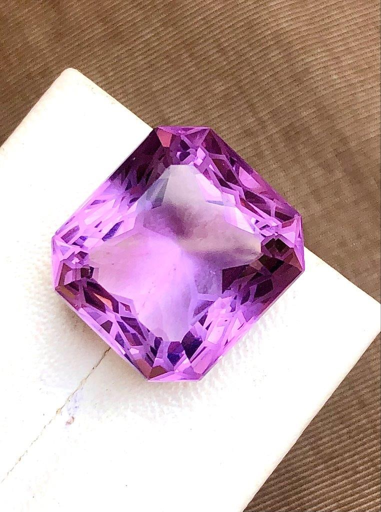 Square Flower Cut Amethyst - 21.15 Carats: Square Flower Cut Amethyst - 21.15 Carats - 17X15X12 mmShipping Rate: $15.00 .shipping rates are determined by Parcel weight and destination.Combined shipping: We offer combine shipping on multiple it