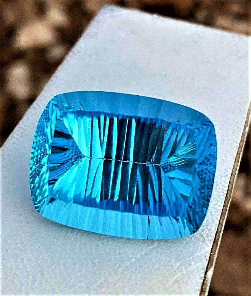 AAA Quality Laser Cut Swiss Blue Topaz - 66.80 Carats: AAA Quality Laser Cut Swiss Blue Topaz - 66.80 Carats - 26X20X15 mmShipping Rate: $15.00 .shipping rates are determined by Parcel weight and destination.Combined shipping: We offer combine shipping on