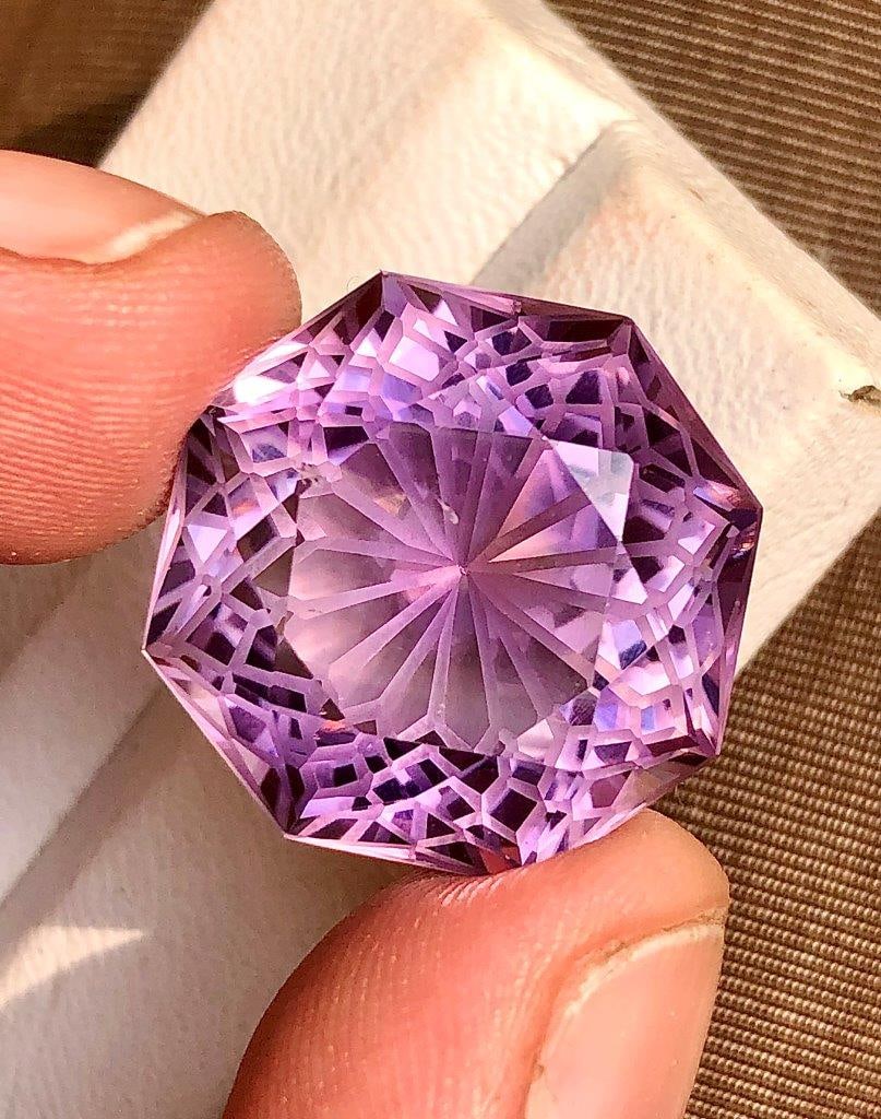 Round Flower Cut Amethyst Gemstone - 24.15 Carats: Round Flower Cut Amethyst Loose Gemstone - 24.15 Carats - 18X18X13 mmShipping Rate: $15.00 .shipping rates are determined by Parcel weight and destination.Combined shipping: We offer combine shipping