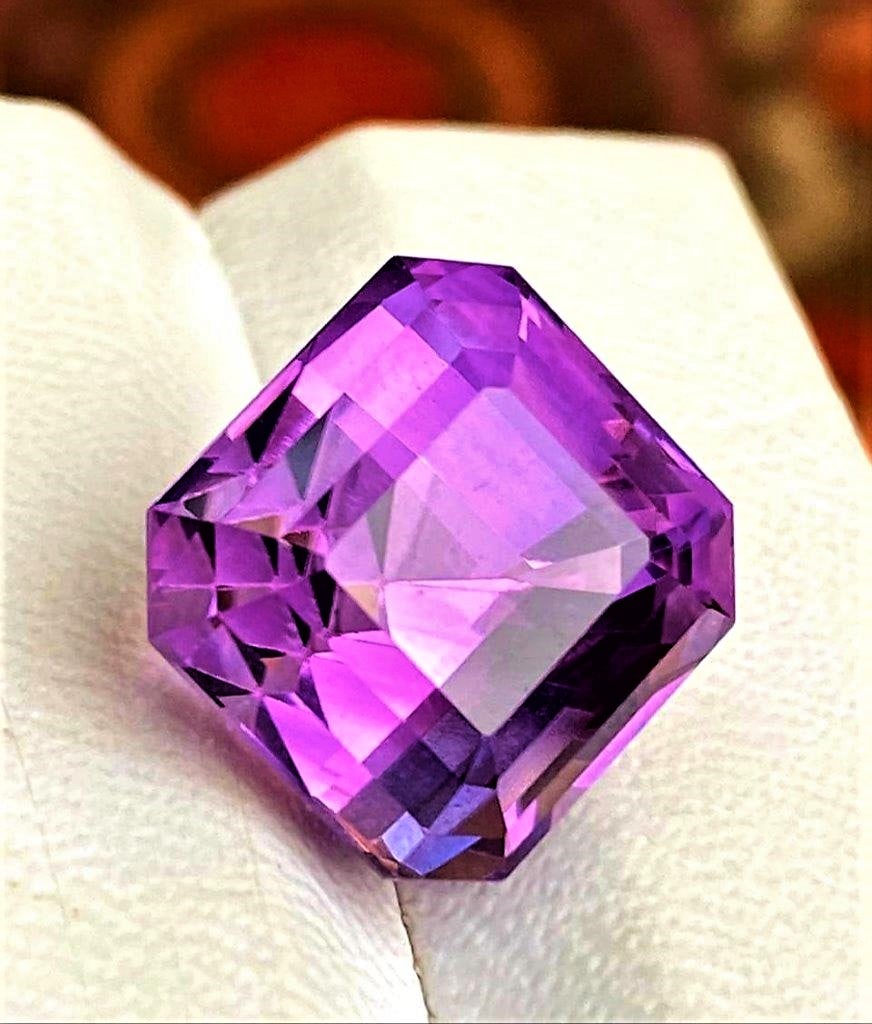 Flawless Asscher Amethyst Gemstone - 31 Carats: Flawless Asscher Amethyst Gemstone - 31 Carats - 19X18X15 mmShipping Rate: $15.00 .shipping rates are determined by Parcel weight and destination.Combined shipping: We offer combine shipping on multip