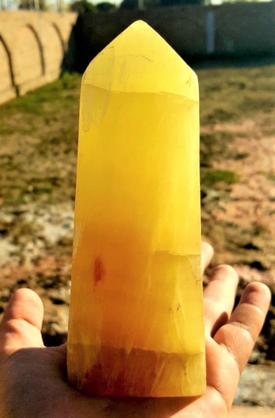 650 Grams Lemon Yellow Point Tower: 650 Grams Lemon Yellow Point TowerShipping Rate: $55.00 .shipping rates are determined by Parcel weight and destination.Combined shipping: We offer combine shipping on multiple items purchased to redu