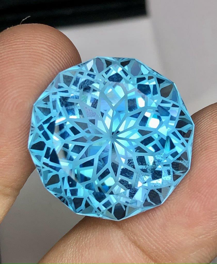 50 Carats AAA Grade Flower Cut Swiss Blue Topaz Gemstone - 23X23X15 mm: 50 Carats AAA Grade Flower Cut Swiss Blue Topaz Gemstone - 23X23X15 mm Shipping Rate: FREE SHIPPINGshipping rates are FREE WORLDWIDECombined shipping: We offer combine shipping on multiple items purch