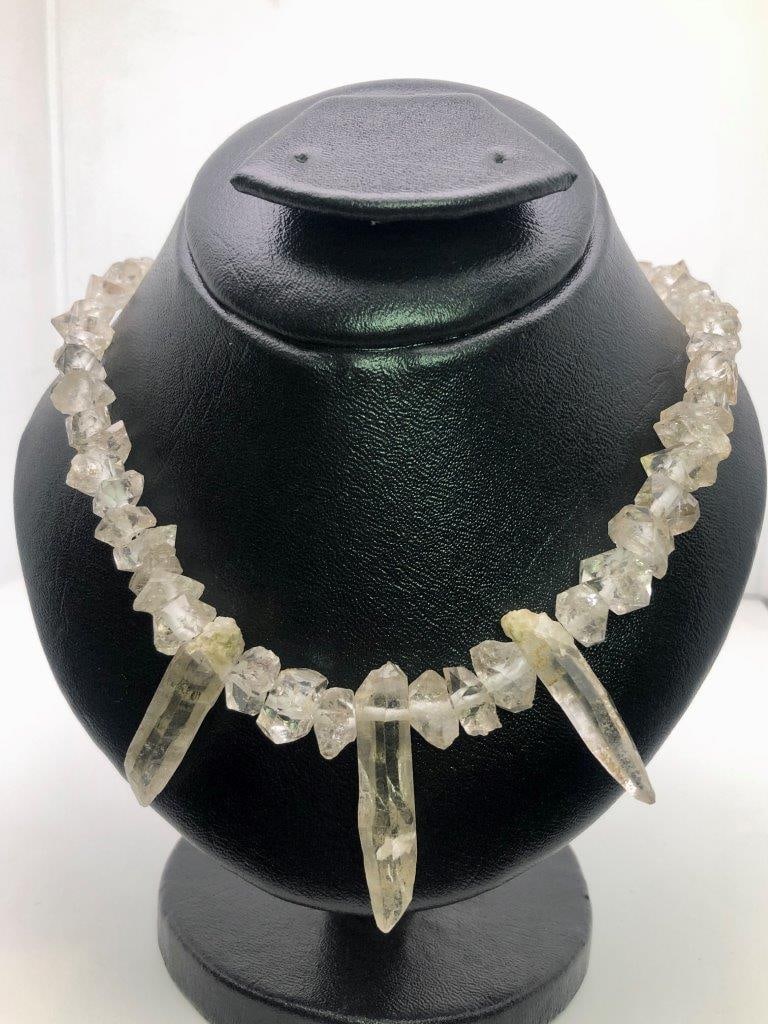 Natural Quartz Crystal Healing Necklace – Clear Quartz Beaded Gemstone Strand: Offered is a beautiful clear quartz crystal necklace composed of polished natural quartz beads. The transparent to semi-transparent stones display the luminous clarity and subtle internal inclusions c