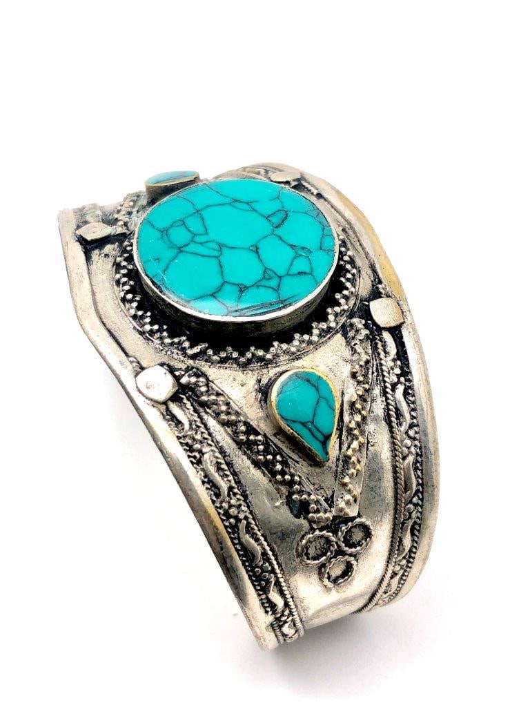 Chinese Turquoise & Brass Bangle Bracelet – Round Natural Stone Accents – Vintage Ethnic Jewelry: Offered is a striking Chinese turquoise and brass bangle bracelet accented with round natural turquoise stones. The vibrant cabochons display characteristic matrix veining and tonal variation, ranging