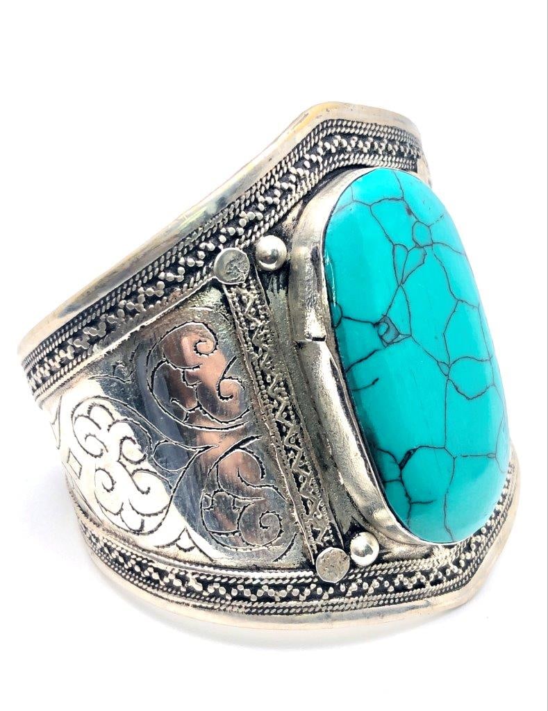 Chinese Turquoise & Brass Bangle Bracelet – Natural Stone Accents – Vintage Ethnic Jewelry: Offered is a striking Chinese turquoise and brass bangle bracelet accented with round natural turquoise stones. The vibrant cabochons display characteristic matrix veining and tonal variation, ranging