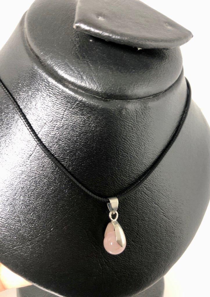Pink Calcite Bead Pendant – Natural Gemstone Jewelry: This delicate pendant features a smooth, natural pink calcite bead, known for its soft pastel hue and calming energy. Perfectly shaped for elegant everyday wear or as a meaningful gift, it can be pair