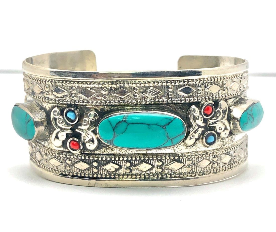 Chinese Turquoise & Brass Bangle Bracelet Vintage Ethnic Jewelry: Offered is a striking Chinese turquoise and brass bangle bracelet accented with round natural turquoise stones. The vibrant cabochons display characteristic matrix veining and tonal variation, ranging