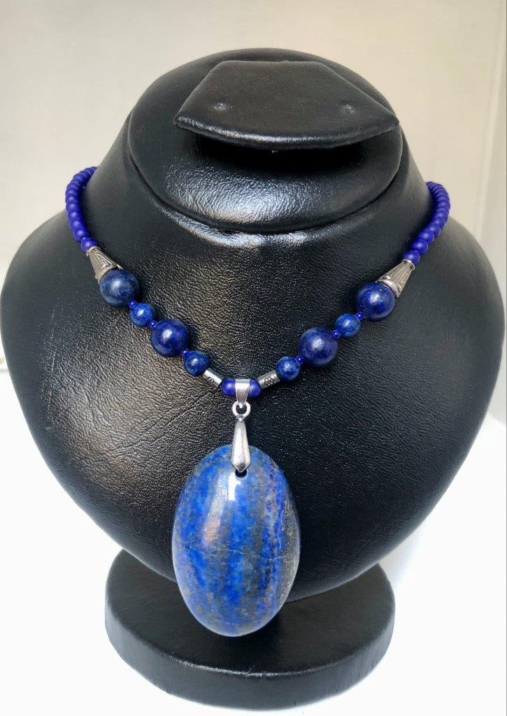 Hand Carved Lapis Lazuli Necklace – Natural Blue Gemstone – Vintage Estate Jewelry: an elegant hand carved lapis lazuli necklace showcasing the rich royal blue coloration for which this gemstone is prized. The stone displays natural variations and may show subtle pyrite inclusions, a