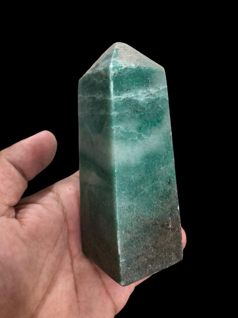 Green Serpentine Tower: Green Serpentine Tower Shipping: $55.00. Shipping rates are determined by Parcel weight and destination.