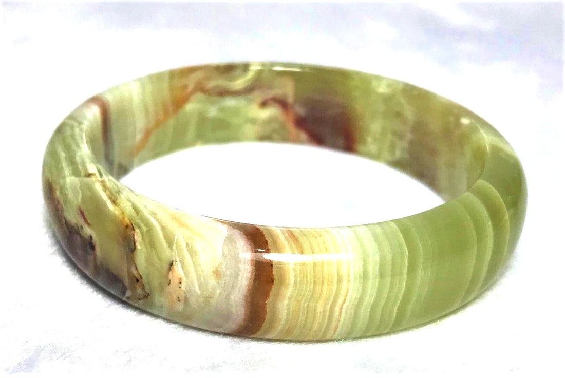 Onyx Beautiful hand bangle multi shade - 68.4G: Onyx Beautiful hand bangle multi shade - 77.5mm - 68.4G Shipping: $23.00. Shipping rates are determined by Parcel weight and destination.