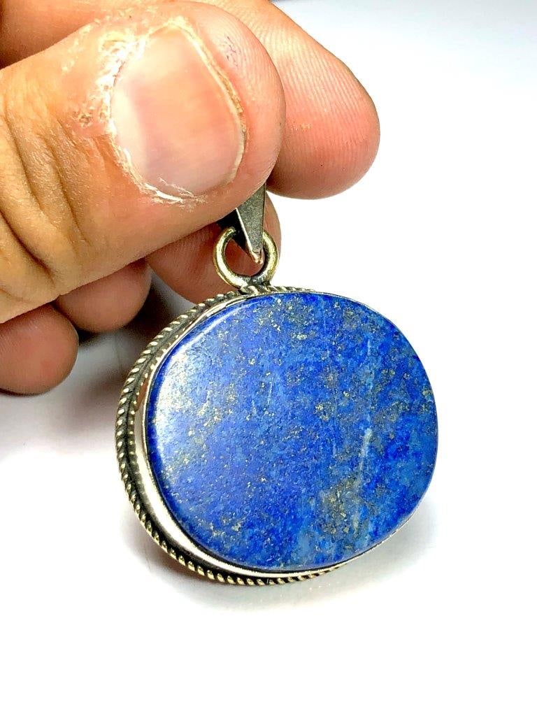 Afghan Origin Lapis Lazuli Pendant: Afghan Origin Lapis Lazuli Pendant Shipping: $23.00. Shipping rates are determined by Parcel weight and destination.