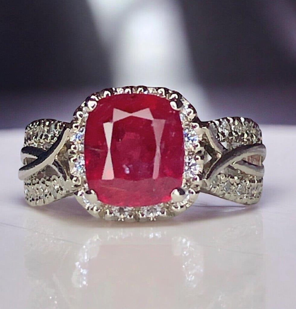 Natural Red Rubelite Tourmaline Ring in Silver With Zircons - Ring Size 5 US: Natural Red Rubelite Tourmaline Ring in Silver With Zircons - Ring Size 5 USstone Weight: 2.30 CaratsRing Size: 5 US(Adjustable)Ring Weight: 4.10 Grams Choose design of your own and we will make it fo