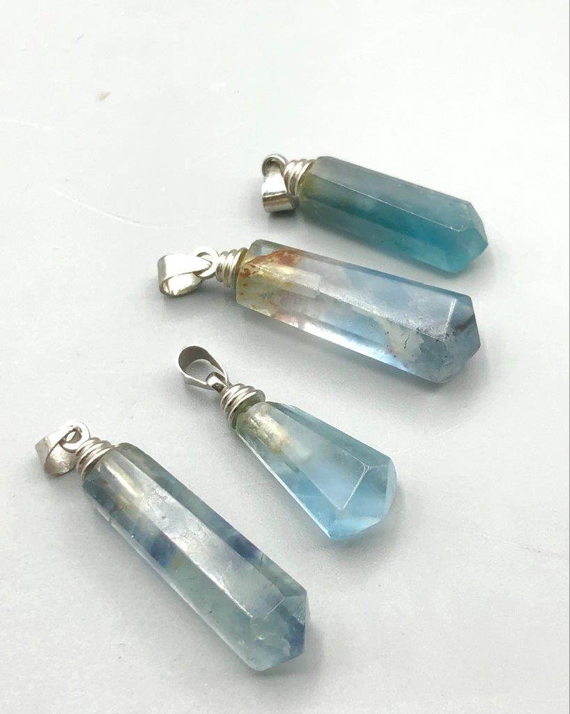 Healing Fluorite Charms Pendants: Healing Fluorite Charms PendantsShipping Rate: $23.00 .shipping rates are determined by Parcel weight and destination.Combined shipping: We offer combine shipping on multiple items purchased to