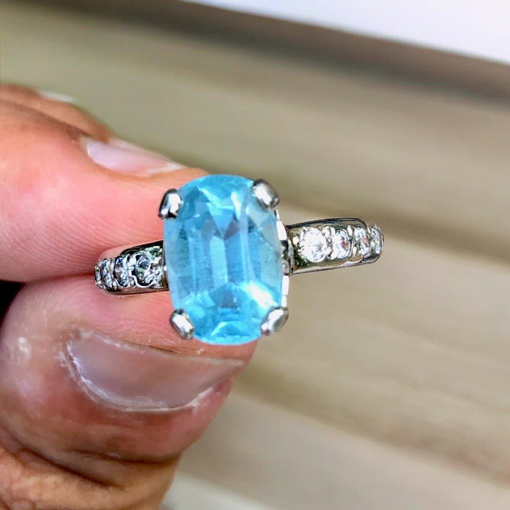 Deep Blue Aquamarine Ring in Silver: Deep Blue Aquamarine Ring in SilverStone Weight: 3.35 CaratsRing Size: 7.5 US(Adjustable)Ring Weight: 4.74 GramsZircons: 30 CentsMetal: Silver Choose design of your own and we will make it for youWe a