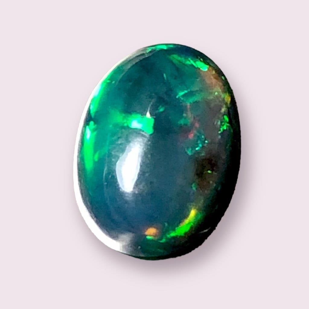 Fire Opal - 1 Carats - 10X7X3 mm (1 of 2)