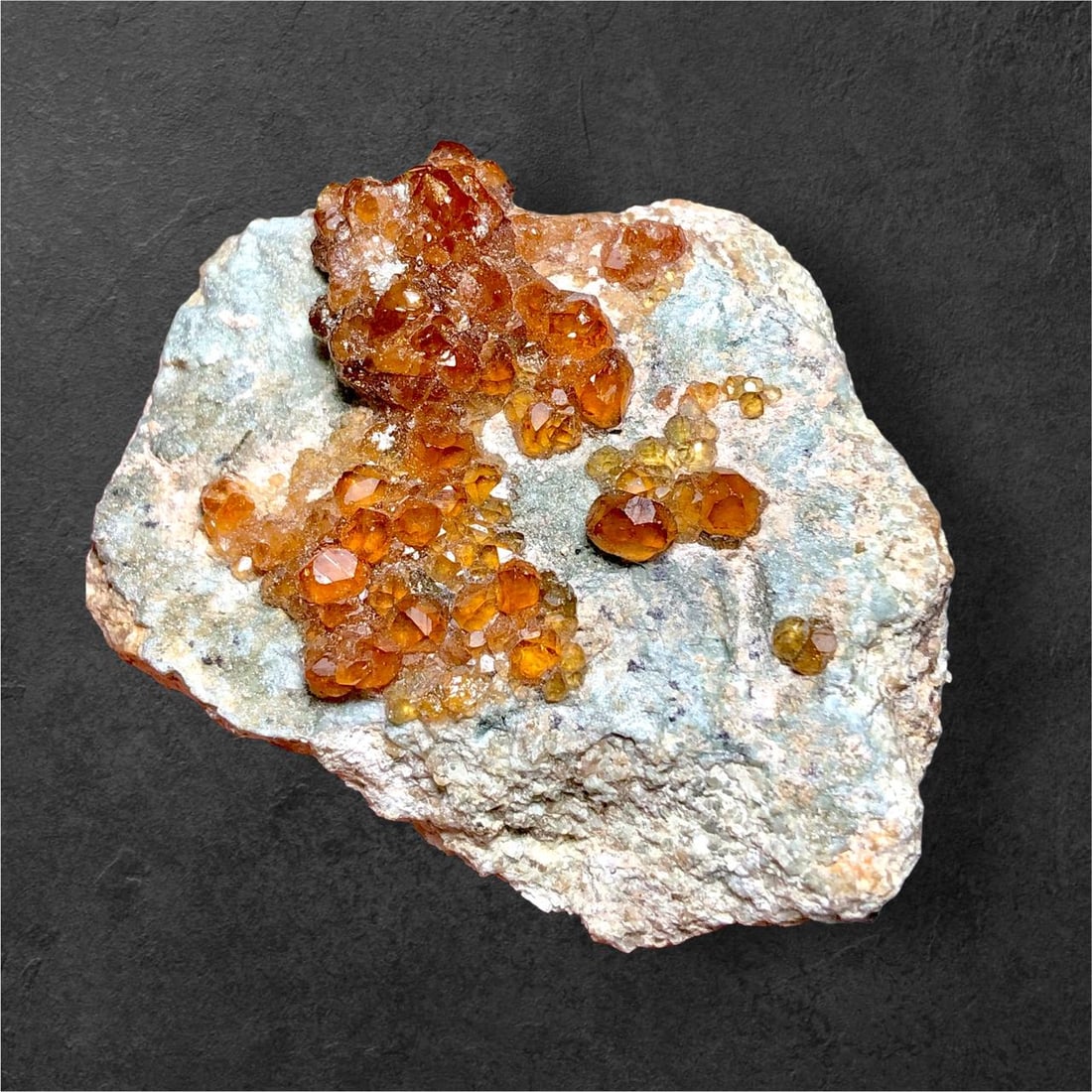 58.5 Grams Natural Hessonite Garnet Cluster on Matrix - 55X42X23 mm: 58.5 Grams Natural Hessonite Garnet Cluster on Matrix - 55X42X23 mmShipping Rate: $25.00 .shipping rates are determined by Parcel weight and destination.Combined shipping: We offer combine shipping on