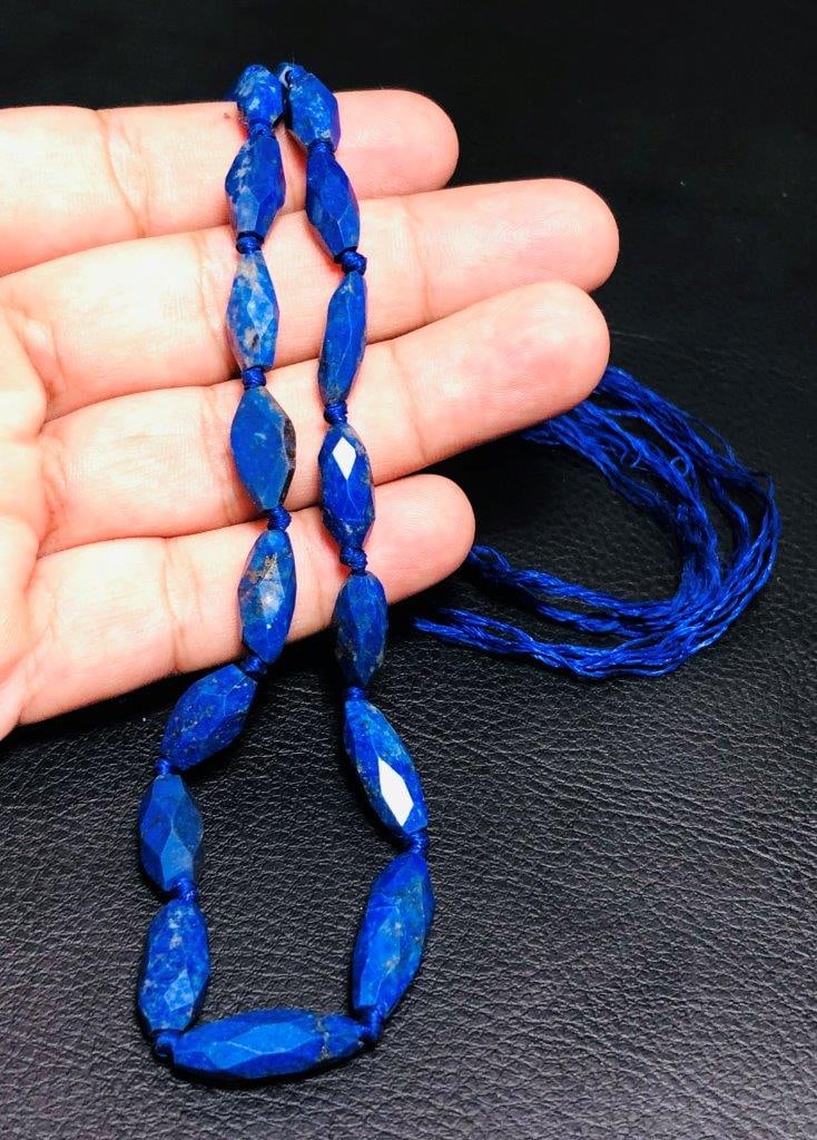 Polished Handmade Royal Blue Lapis Necklace: Polished Handmade Royal Blue Lapis Necklace Shipping: $23.00. Shipping rates are determined by Parcel weight and destination.