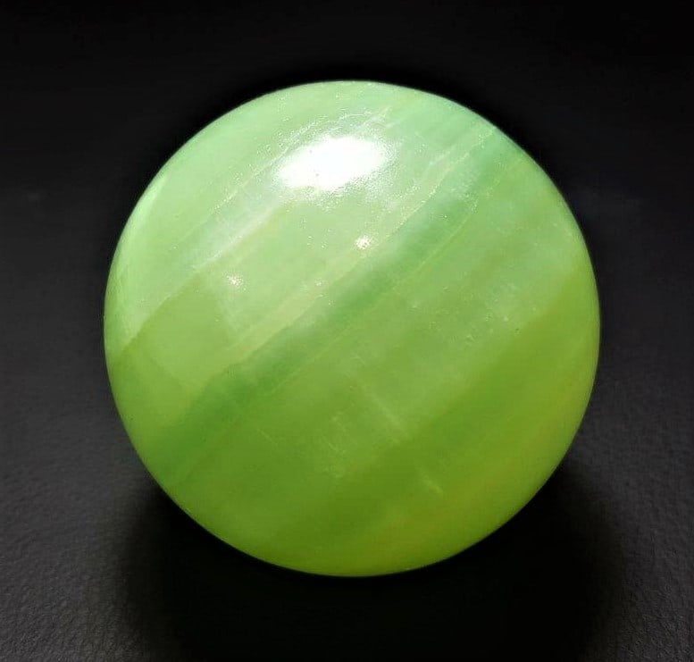 AAA Bright Teal Pistachio Calcite Sphere 384 Grams: AAA Bright Teal Pistachio Calcite Sphere 384 Grams - 63 mmShipping Rate: $45.00 .shipping rates are determined by Parcel weight and destination.Combined shipping: We offer combine shipping on multiple