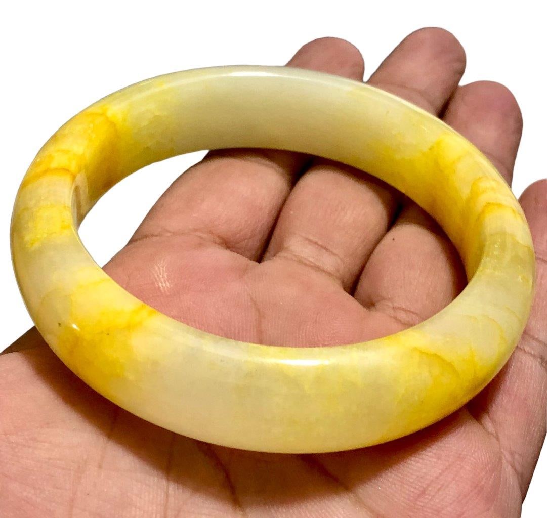 Pretty Yellow Bangle - Onyx Dyed Jewelry: Pretty Yellow Bangle - Onyx Dyed Jewelry Shipping: $23.00. Shipping rates are determined by Parcel weight and destination.