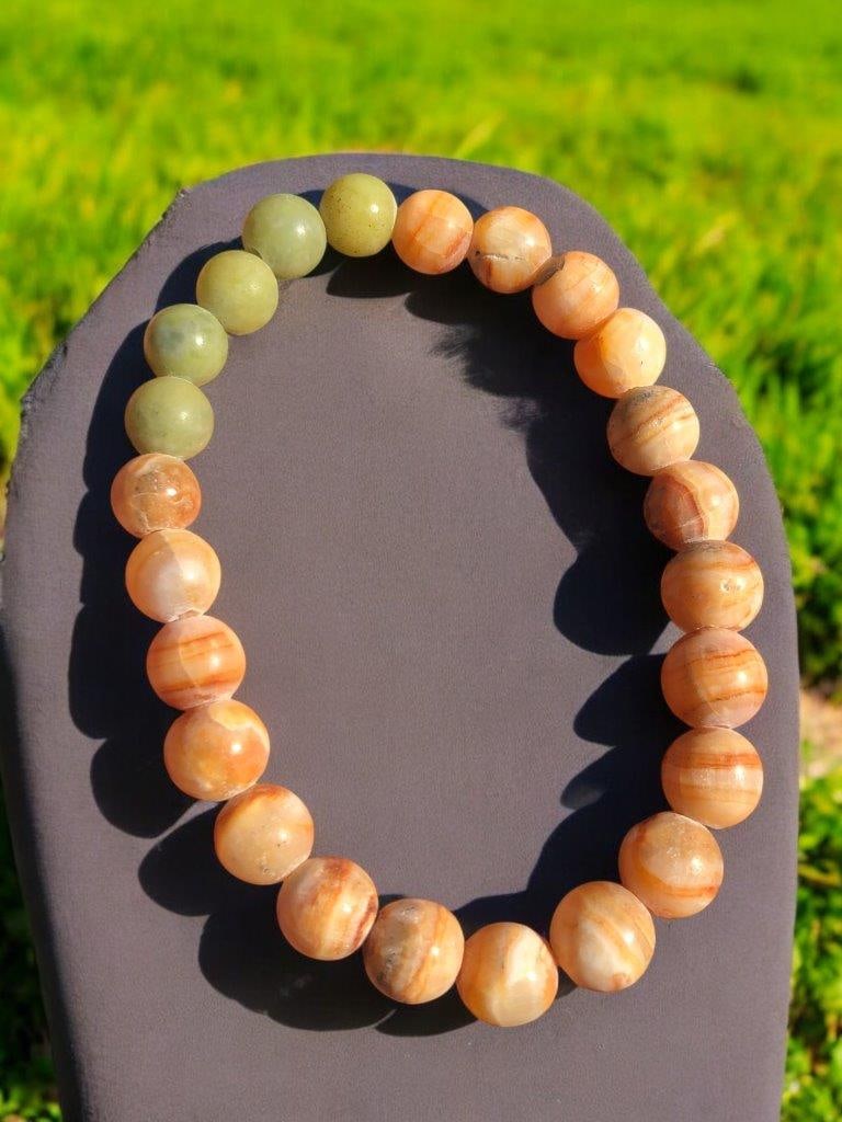 Calibrated Nephrite Calcite Mix Beaded Bracelet: Calibrated Nephrite Calcite Mix Beaded Bracelet Shipping: