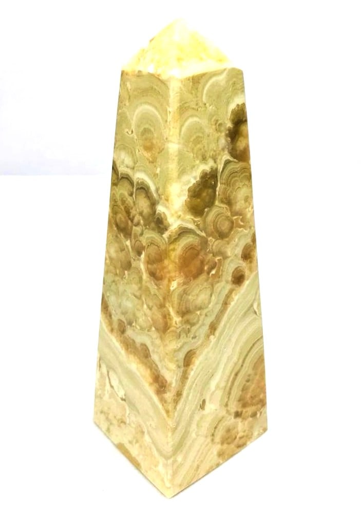 Polished Choclate Calcite point tower - 620G: Polished Choclate Calcite point tower - 155X52mm - 620G Shipping: $55.00. Shipping rates are determined by Parcel weight and destination.