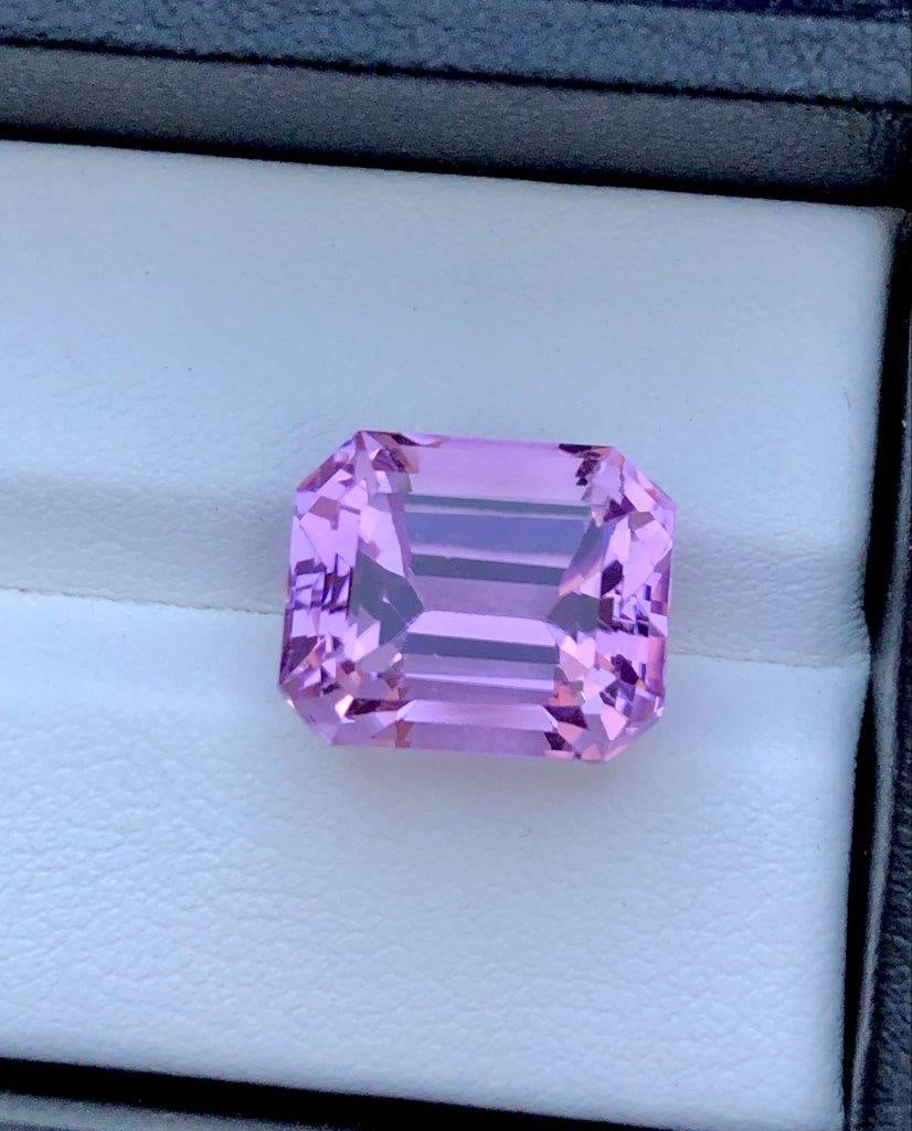 Emerald Cut Pink Kunzite - 13.30 Carats - 15X11X10 mm: Emerald Cut Pink Kunzite - 13.30 Carats - 15X11X10 mmShipping Rate: $15.00 .shipping rates are determined by Parcel weight and destination.Combined shipping: We offer combine shipping on multiple item