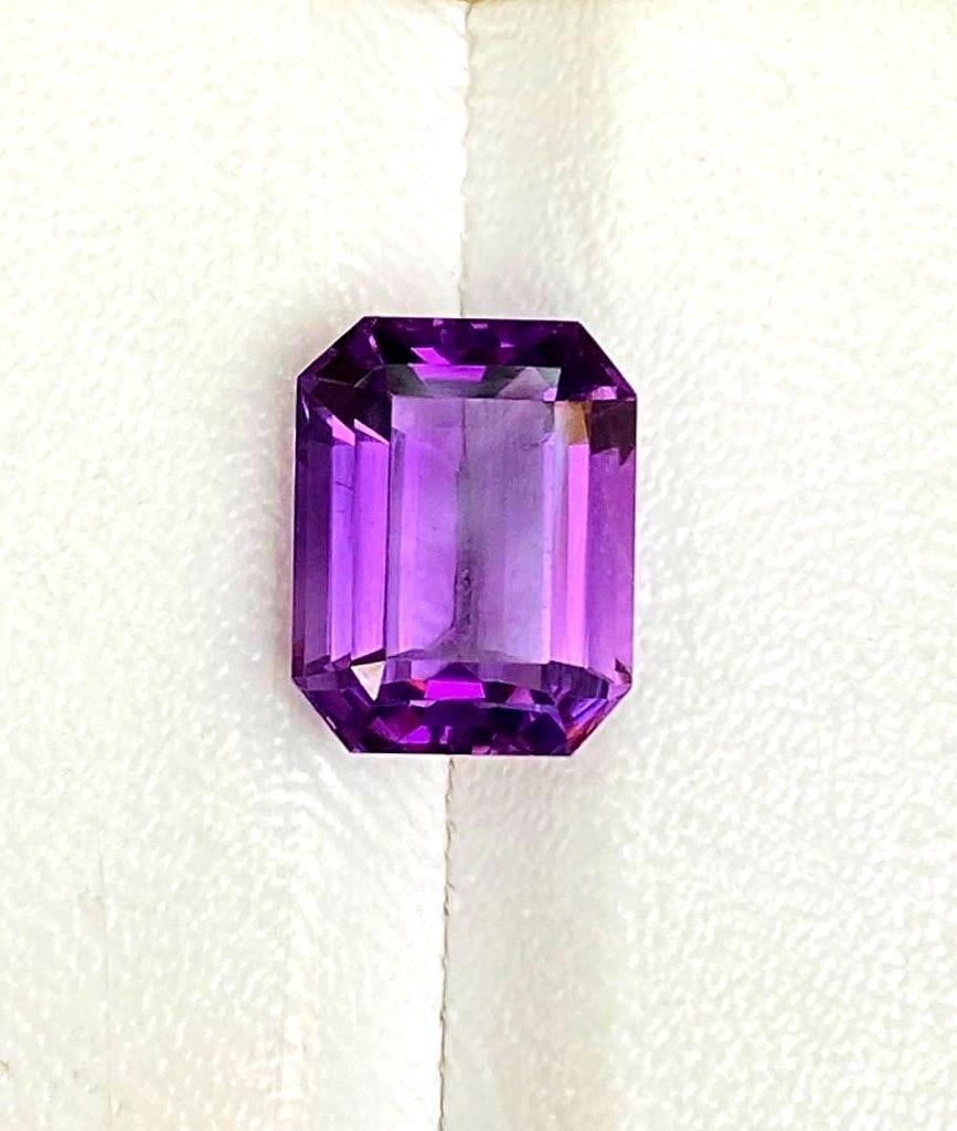 Emerald Cut Amethyst Gem - 8 Carats - 14X11X8 mm: Emerald Cut Amethyst Gem - 8 Carats - 14X11X8 mmShipping Rate: $15.00 .shipping rates are determined by Parcel weight and destination.Combined shipping: We offer combine shipping on multiple items pur