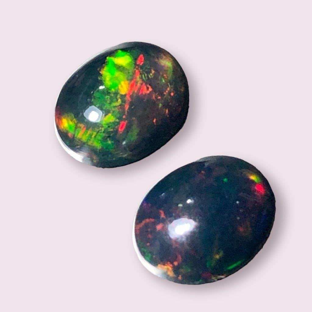 2.75 Carats Black Opal With Natural Fire: 2.75 Carats Black Opal With Natural FireShipping Rate: $15.00 .shipping rates are determined by Parcel weight and destination.Combined shipping: We offer combine shipping on multiple items purchased t