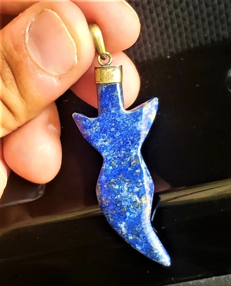 Sterling Silver Lapis Pendant: Sterling Silver Lapis Pendant - 53X20X5 mm Shipping: $23.00. Shipping rates are determined by Parcel weight and destination.