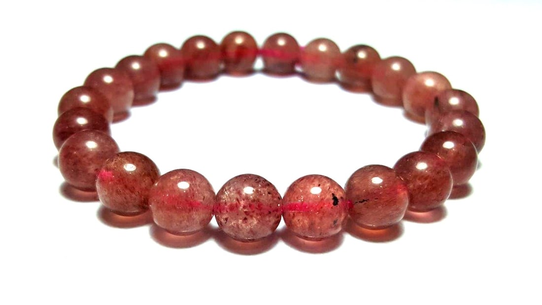 Baby Pink Rose Quartz Crystal Bracelet: Baby Pink Rose Quartz Crystal Bracelet - Round Beads Shipping: $23.00. Shipping rates are determined by Parcel weight and destination.