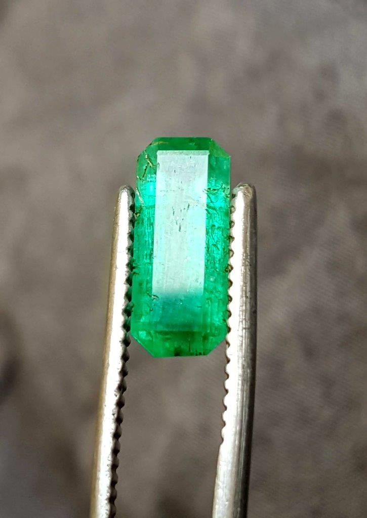 Afghan Origin Natural Emerald - 1.95 Carats: Afghan Origin Natural Emerald - 1.95 Carats - 13X5.5X5 mmShipping Rate: $15.00 .shipping rates are determined by Parcel weight and destination.Combined shipping: We offer combine shipping on multiple