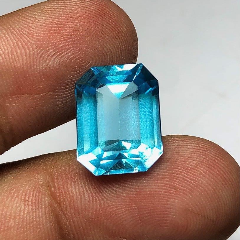 AAA Quality Swiss Blue Topaz - 12.80 Carats: AAA Quality Swiss Blue Topaz - 12.80 Carats - 14X11X9 mmShipping Rate: $15.00 .shipping rates are determined by Parcel weight and destination.Combined shipping: We offer combine shipping on multiple i