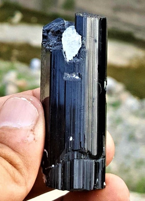 Natural Schorl Tourmaline Mineral - 69.2 Grams: Natural Schorl Tourmaline Mineral - 69.2 Grams - 56X25X21 mmShipping Rate: $23.00 .shipping rates are determined by Parcel weight and destination.Combined shipping: We offer combine shipping on multip