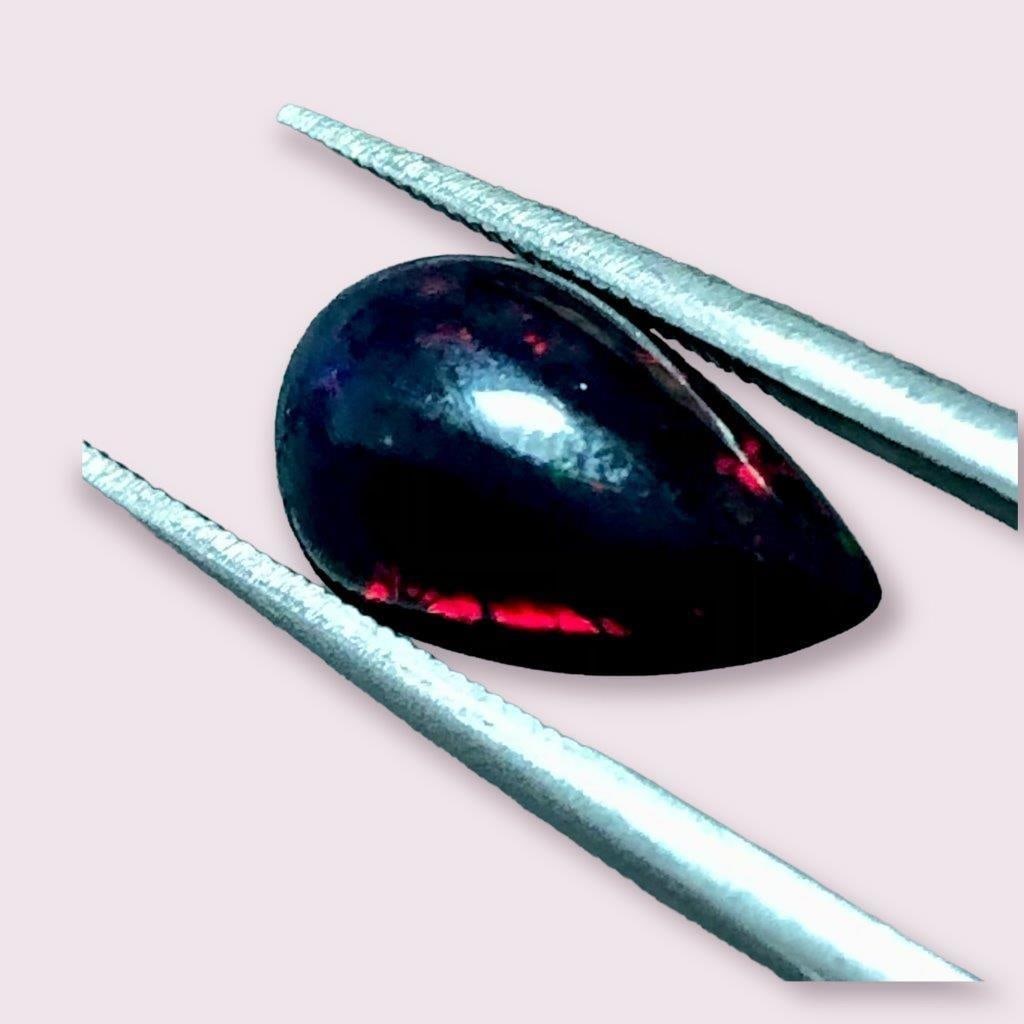 Fire Opal - 1.85 Carats - 13X7X5 mm: Fire Opal - 1.85 Carats - 13X7X5 mmShipping Rate: $15.00 .shipping rates are determined by Parcel weight and destination.Combined shipping: We offer combine shipping on multiple items purchased to red