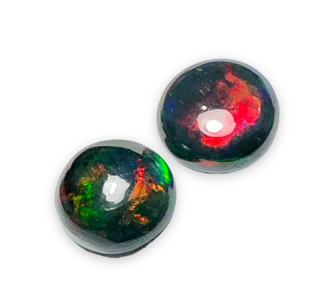 3.35 Carats Black Opal Paired - 8X6 mm: 3.35 Carats Black Opal Paired - 8X6 mmShipping Rate: FREE SHIPPINGshipping rates are FREE WORLDWIDECombined shipping: We offer combine shipping on multiple items purchased to reduce shipping cost.