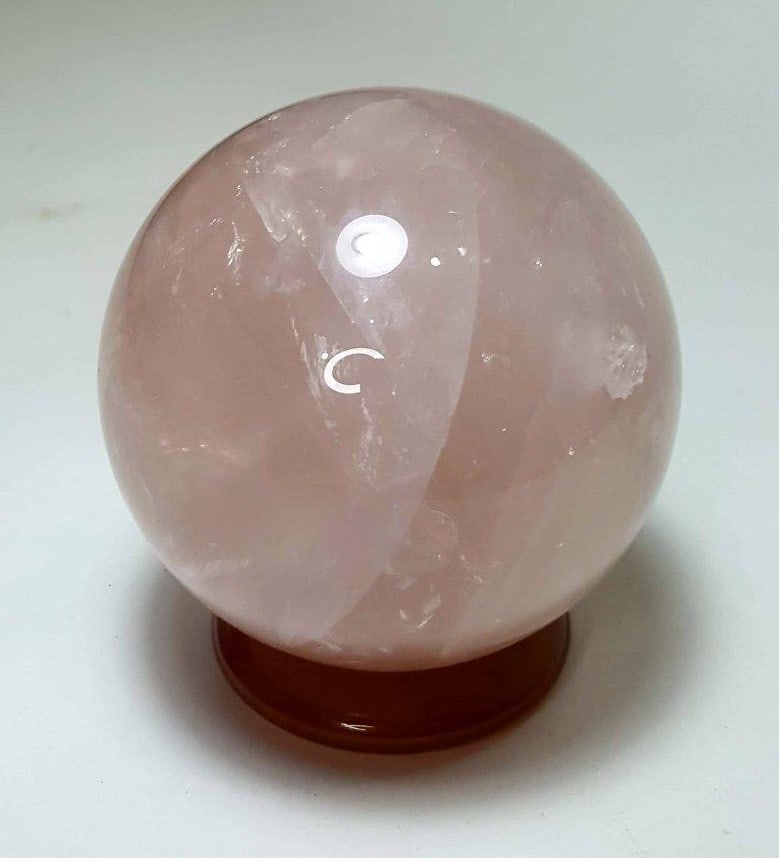 Natural Pink Rose Quartz Sphere - 1122 Grams: Natural Pink Rose Quartz Sphere - 1122 Grams - Diameter 93 mmShipping Rate: $80.00 .shipping rates are determined by Parcel weight and destination.Combined shipping: We offer combine shipping on multi