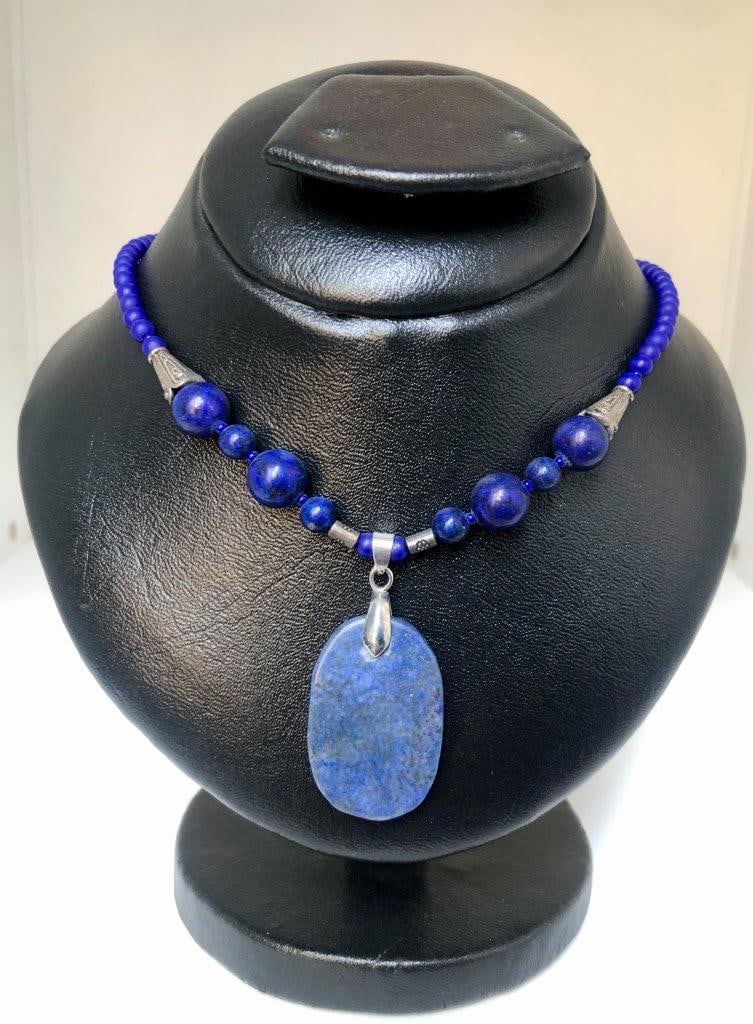 Lapis Lazuli Necklace Natural Beads– Natural Blue Gemstone – Vintage Estate Jewelry: an elegant hand carved lapis lazuli necklace showcasing the rich royal blue coloration for which this gemstone is prized. The stone displays natural variations and may show subtle pyrite inclusions, a