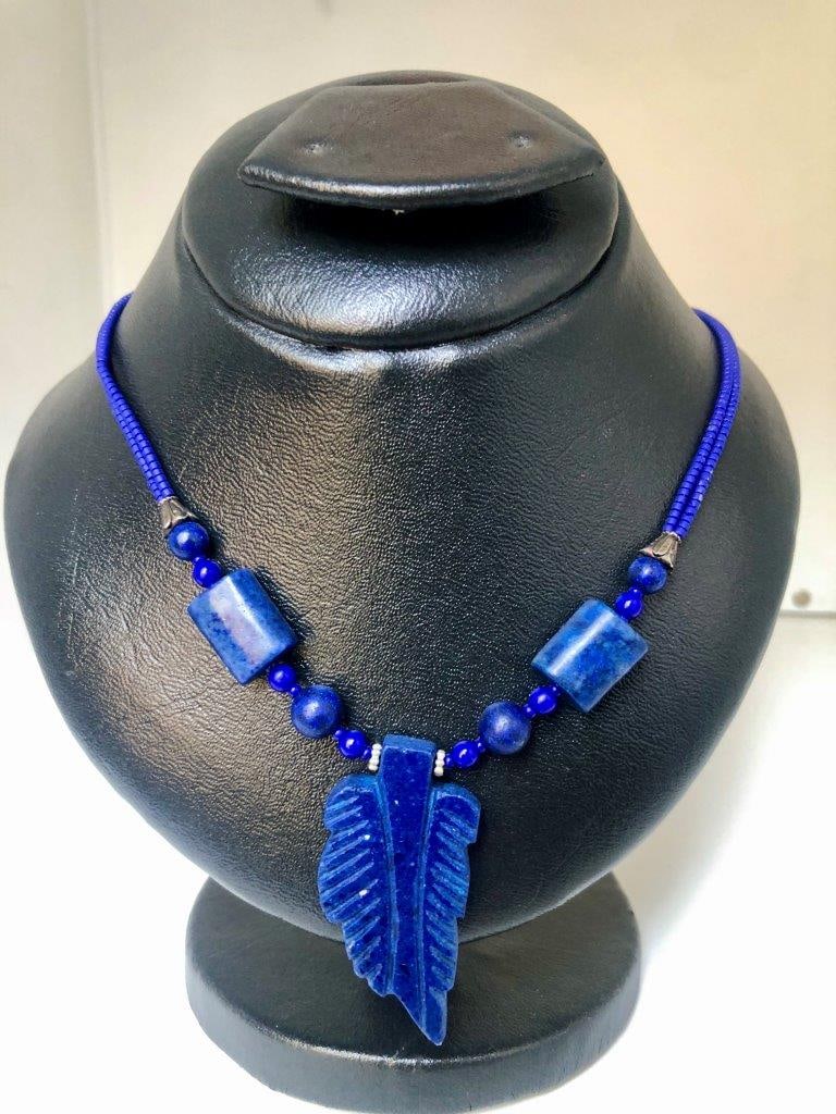Hand Carved Lapis Lazuli Necklace – Natural Blue Gemstone – Vintage Estate Jewelry: an elegant hand carved lapis lazuli necklace showcasing the rich royal blue coloration for which this gemstone is prized. The stone displays natural variations and may show subtle pyrite inclusions, a