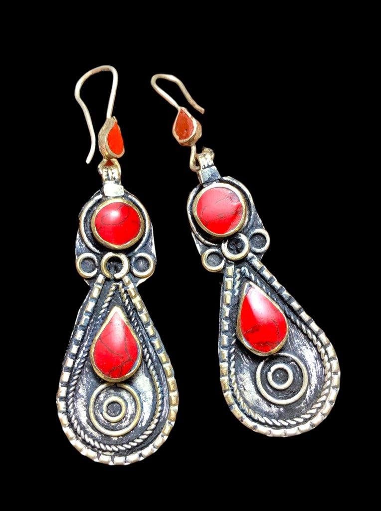 Coral Earrings in Brass: Coral Earrings in Brass Shipping Rate: $23.00 .shipping rates are determined by Parcel weight and destination.Combined shipping: We offer combine shipping on multiple items purchased to reduce shippin