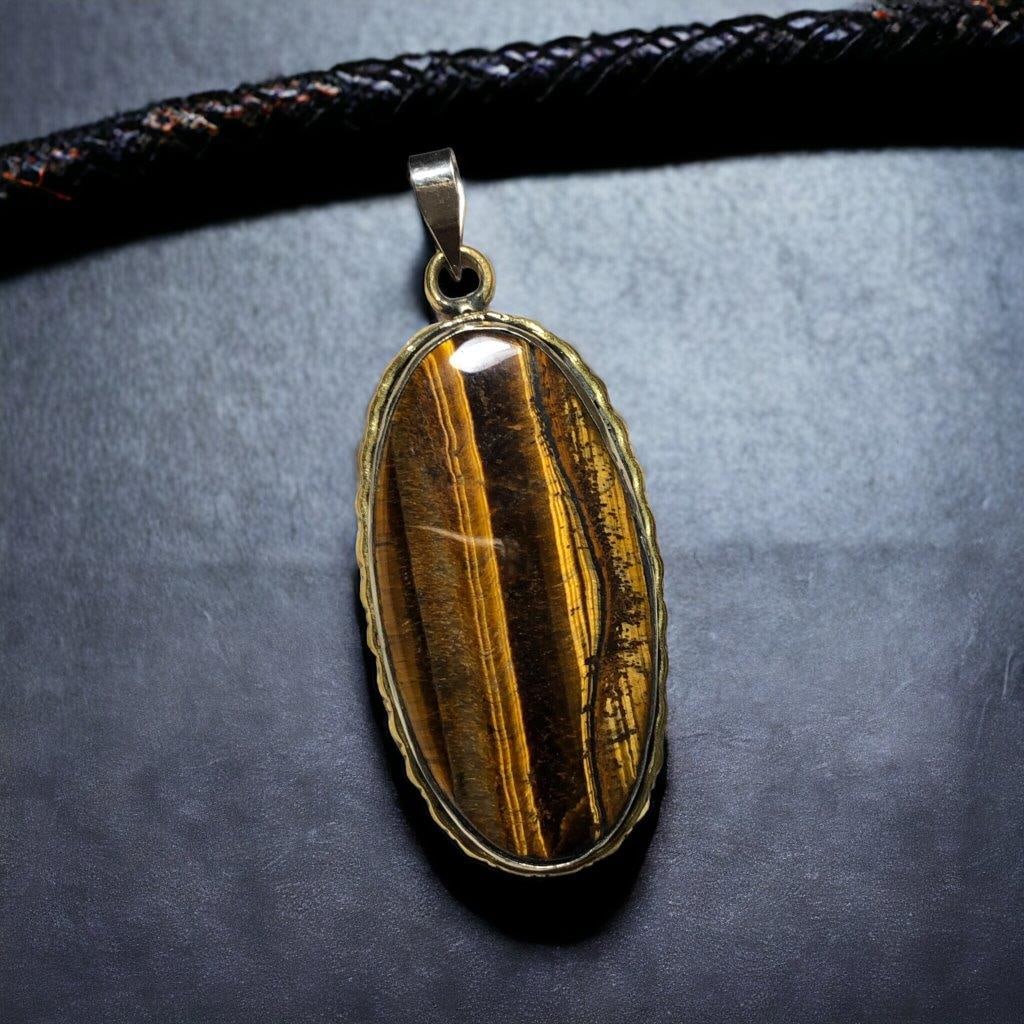 Tiger's eye crystal Pendant in Silver: 4.35 Carats Natural Aquamarine Cab - 11X9X6 mm Shipping: