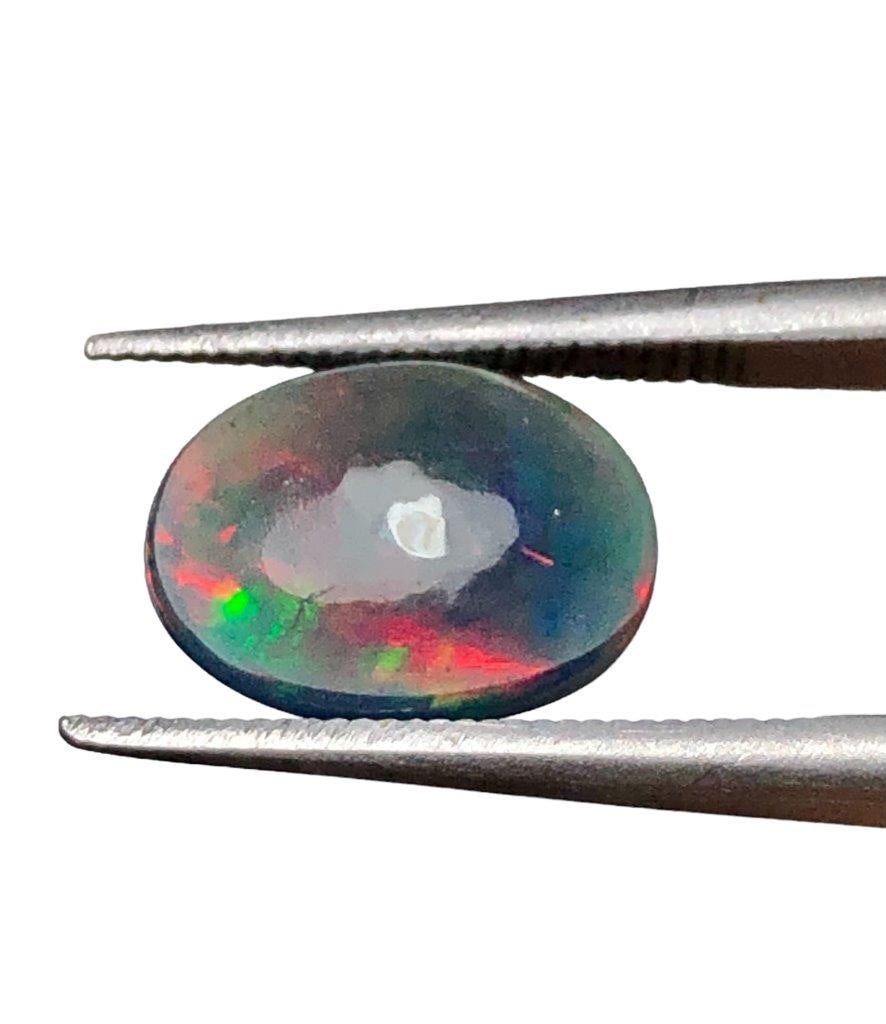 1.10 Carats Black Opal - 10X8X4 mm (1 of 3)