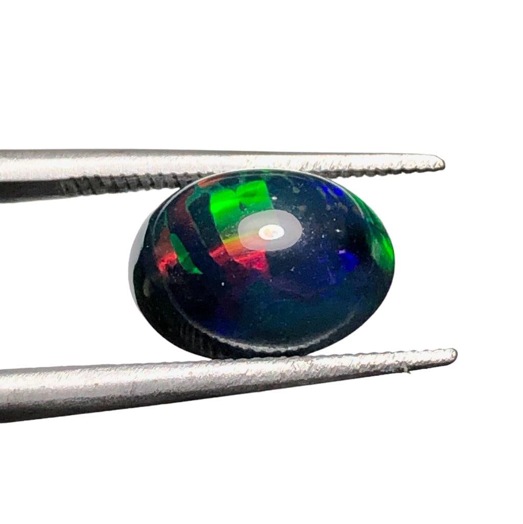 Black Opal With Amazing - 1.40 Carats - 10X8X6 mm (1 of 2)