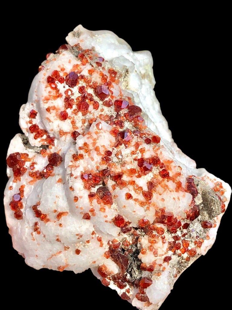 138 Grams Spessartine Garnet Mineral Specimen - 75X53X46 mm: 138 Grams Spessartine Garnet Mineral Specimen - 75X53X46 mm Shipping Rate: FREE SHIPPINGshipping rates are determined by Parcel weight and destination.Combined shipping: We offer combine shipping on m