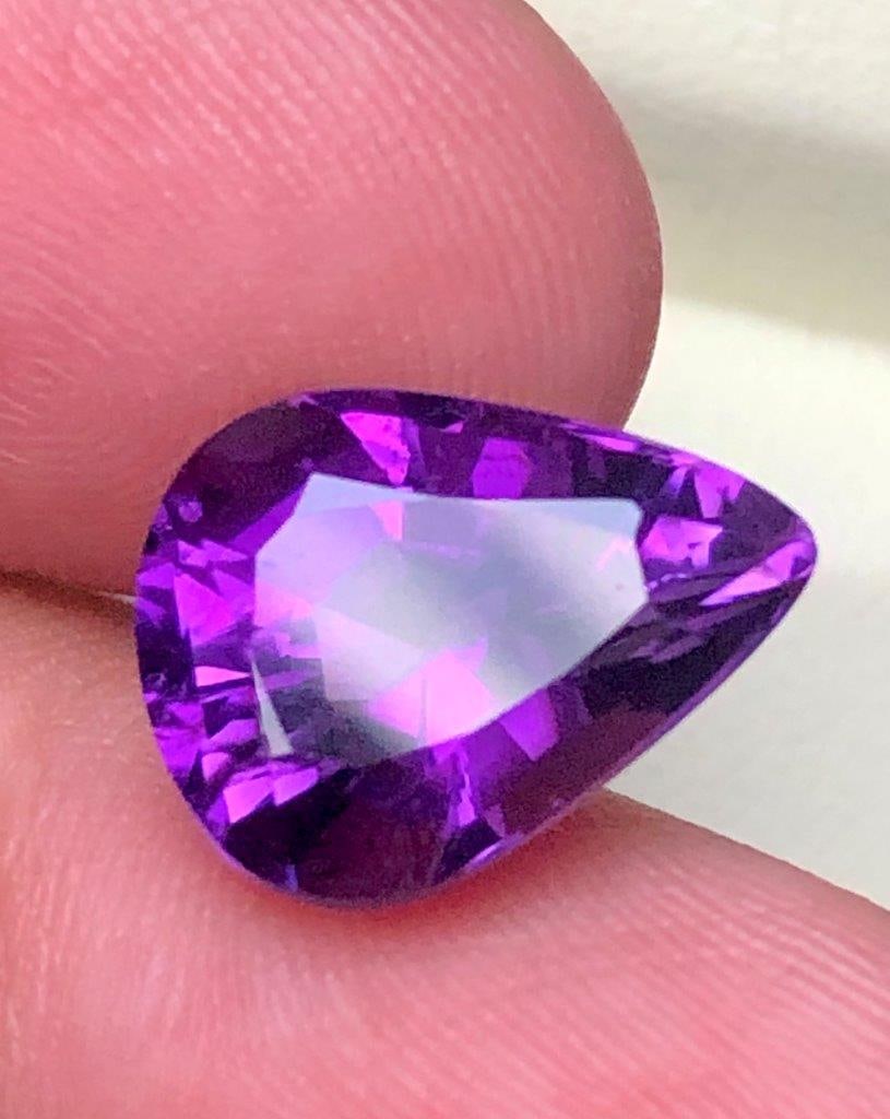7.10 Cts Natural Amethyst Gemstone AAA Quality Purple Crystal Healing Stone Jewelry Making Gem -: Beautiful 7.10 carats AAA quality natural Amethyst gemstone featuring a rich purple color, excellent clarity, and brilliant natural sparkle. Measuring 16x11x9 mm, this finely cut loose crystal is perf