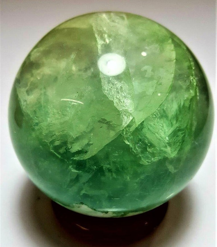 Beautiful Fluorite Sphere - 1441 Grams: Beautiful Fluorite Sphere - 1441 Grams - Diameter 94 mmShipping Rate: $85.00 .shipping rates are determined by Parcel weight and destination.Combined shipping: We offer combine shipping on multiple it